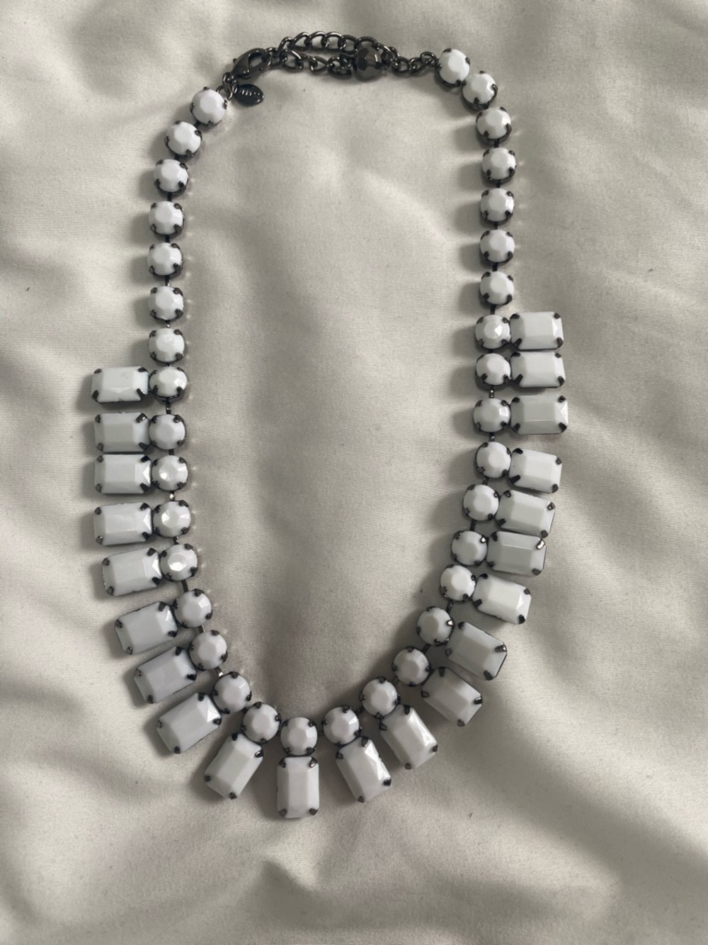 Express White Statement Bib Necklace with Gunmetal Setting